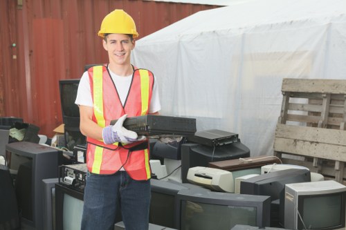 Professionals handling office waste in Bow