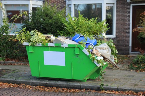 Professional waste clearance team managing construction debris